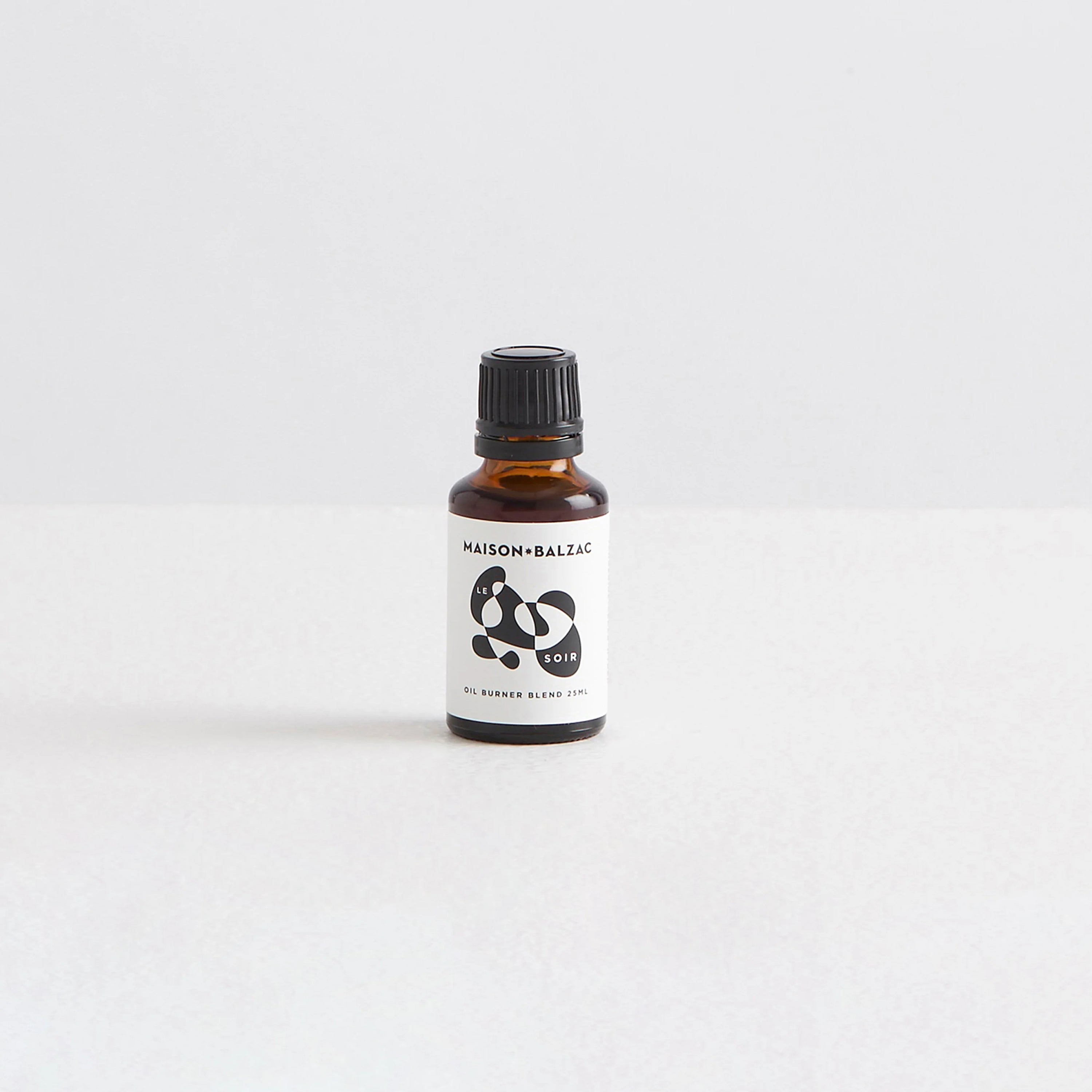 Bottle containing an essential oil blend called 'Le Soir'